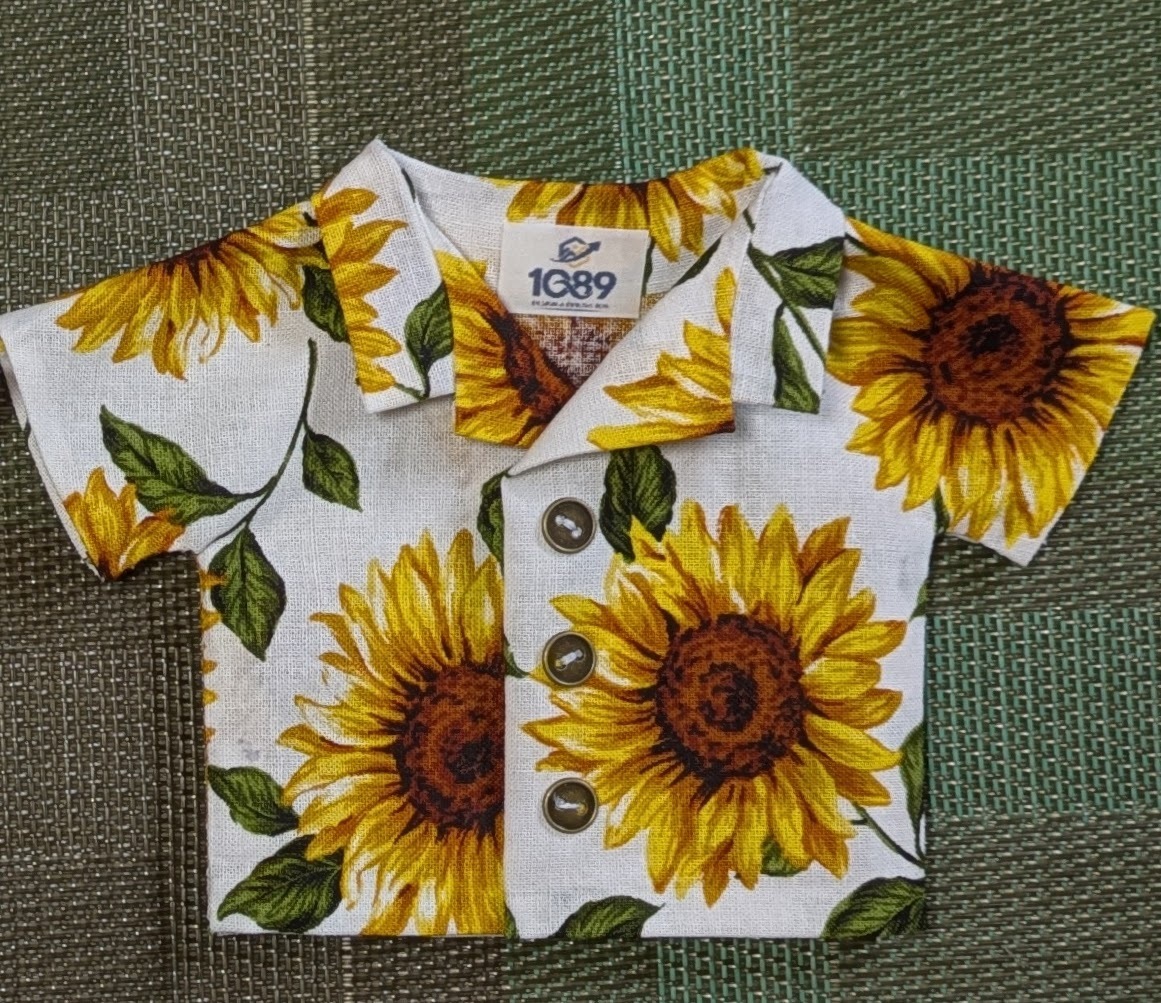 夏夏夏。ひまわり🌻に埋もれたはち丸。 | ロボホンともだち広場